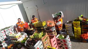 United Hatzalah of the Carmel Region collecting food to donate to families in need this holiday.  