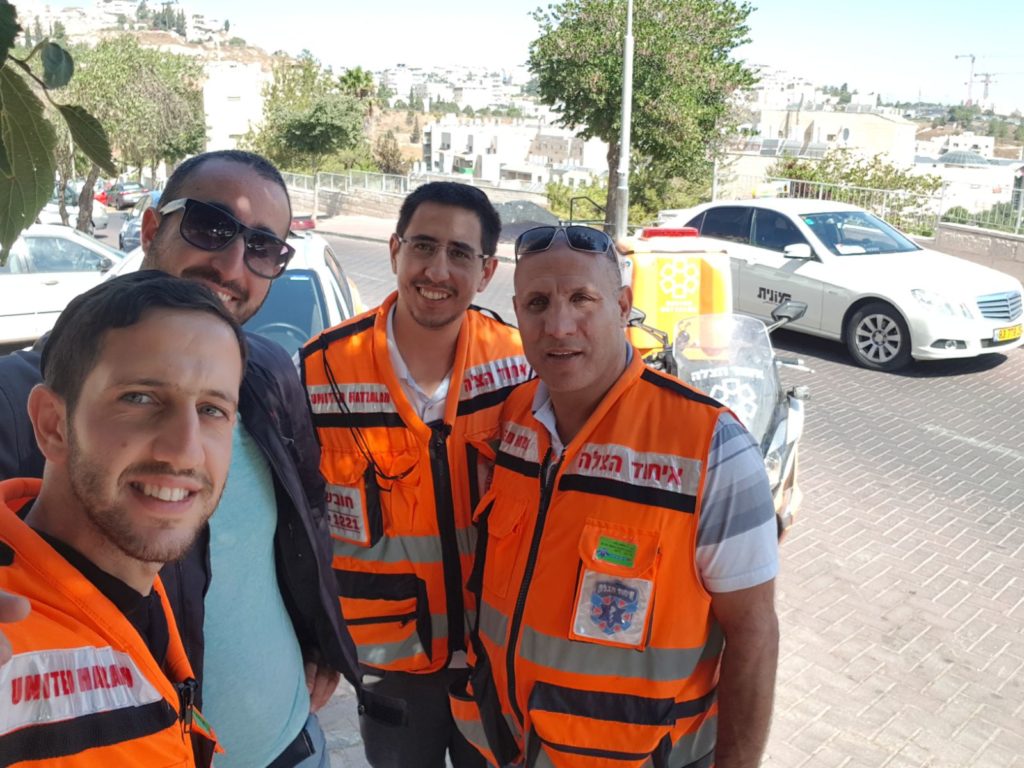 Ariel Ben David (left) with volunteers Gavriel Struck, Itamar Hamo and Ischak Hadad 1