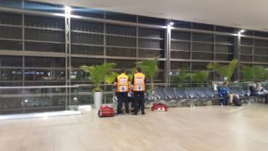 Moshe and Dvir treat the patient in the airport.