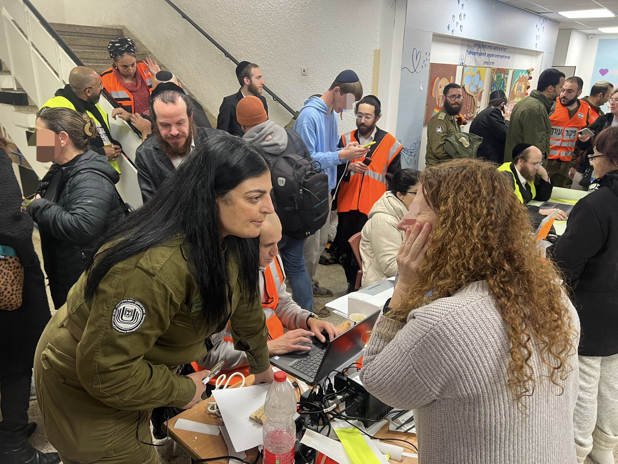 United Hatzalah Medic Linor Attias at the scene of an impact site caring for those affected.