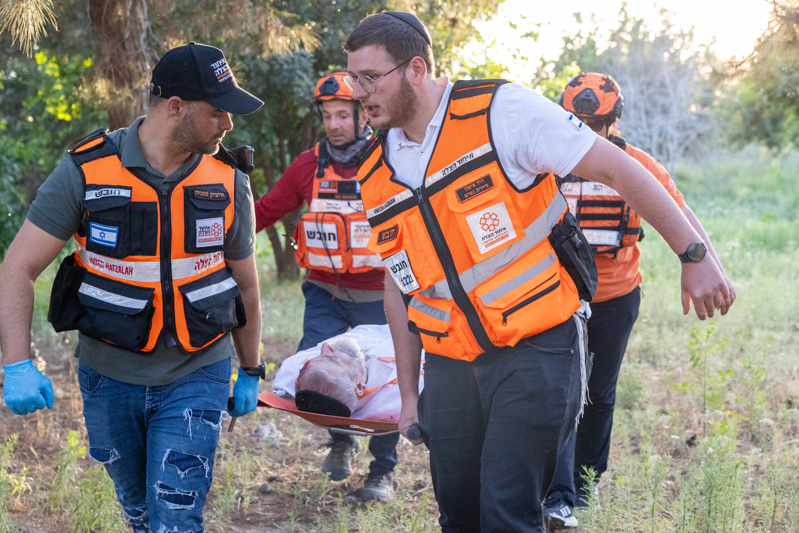 United Hatzalah medics evacuate an injured man during a Mass Casualty Incident training drill in the Gaza Envelope region of Southern Israel