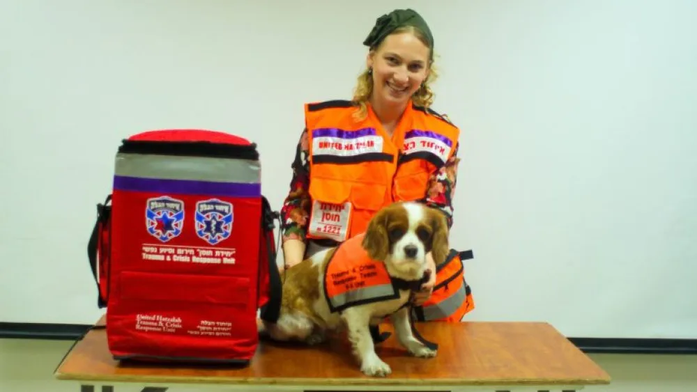 United Hatzalah volunteer Batya Jaffe and United Hatzalah Psychotrauma Rescue Dog Lucy