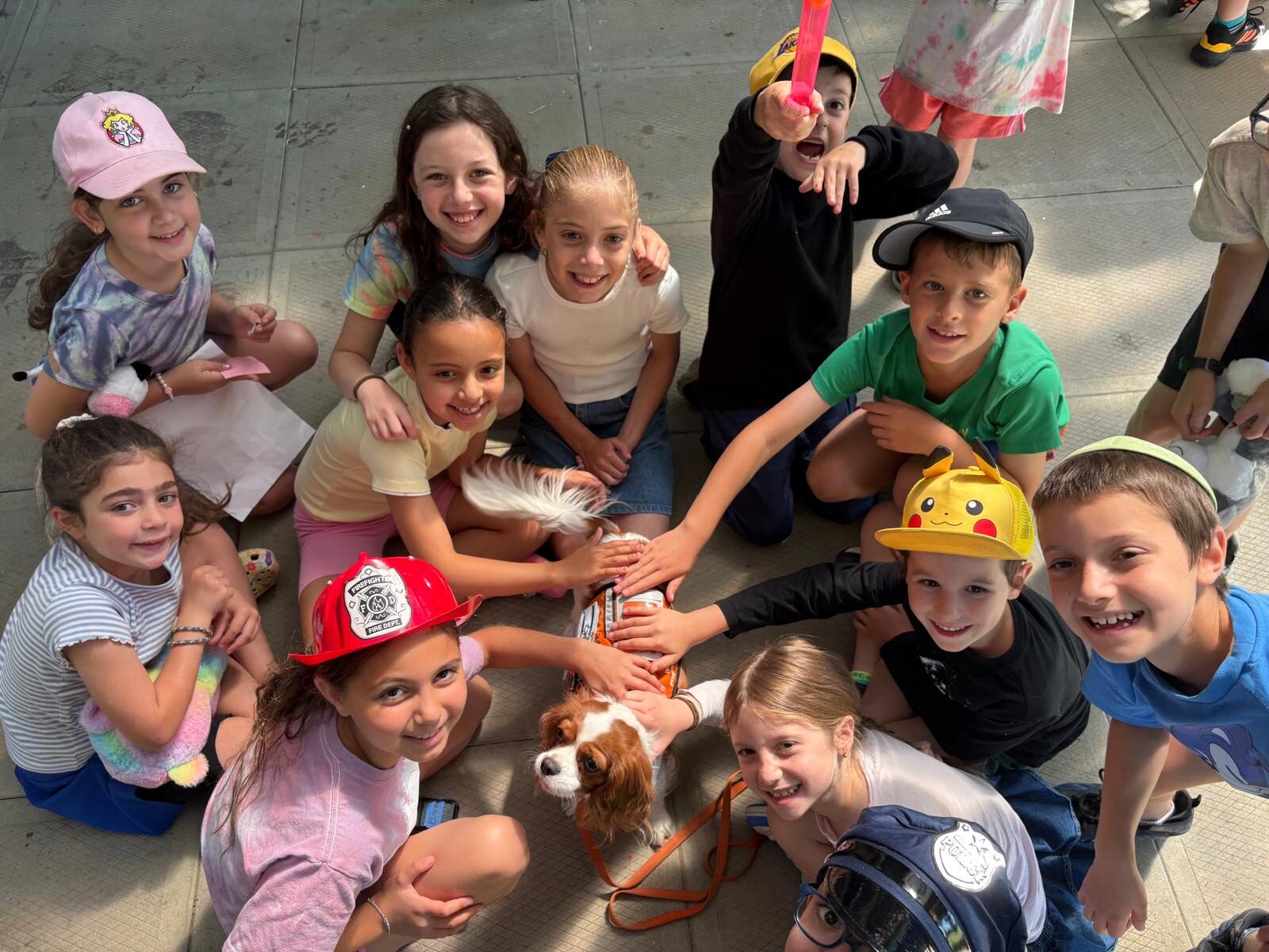 Campers at Camp Moshava Ba'ir Toronto participate in special First Responders Day with United Hatzalah Support Dog, Hope