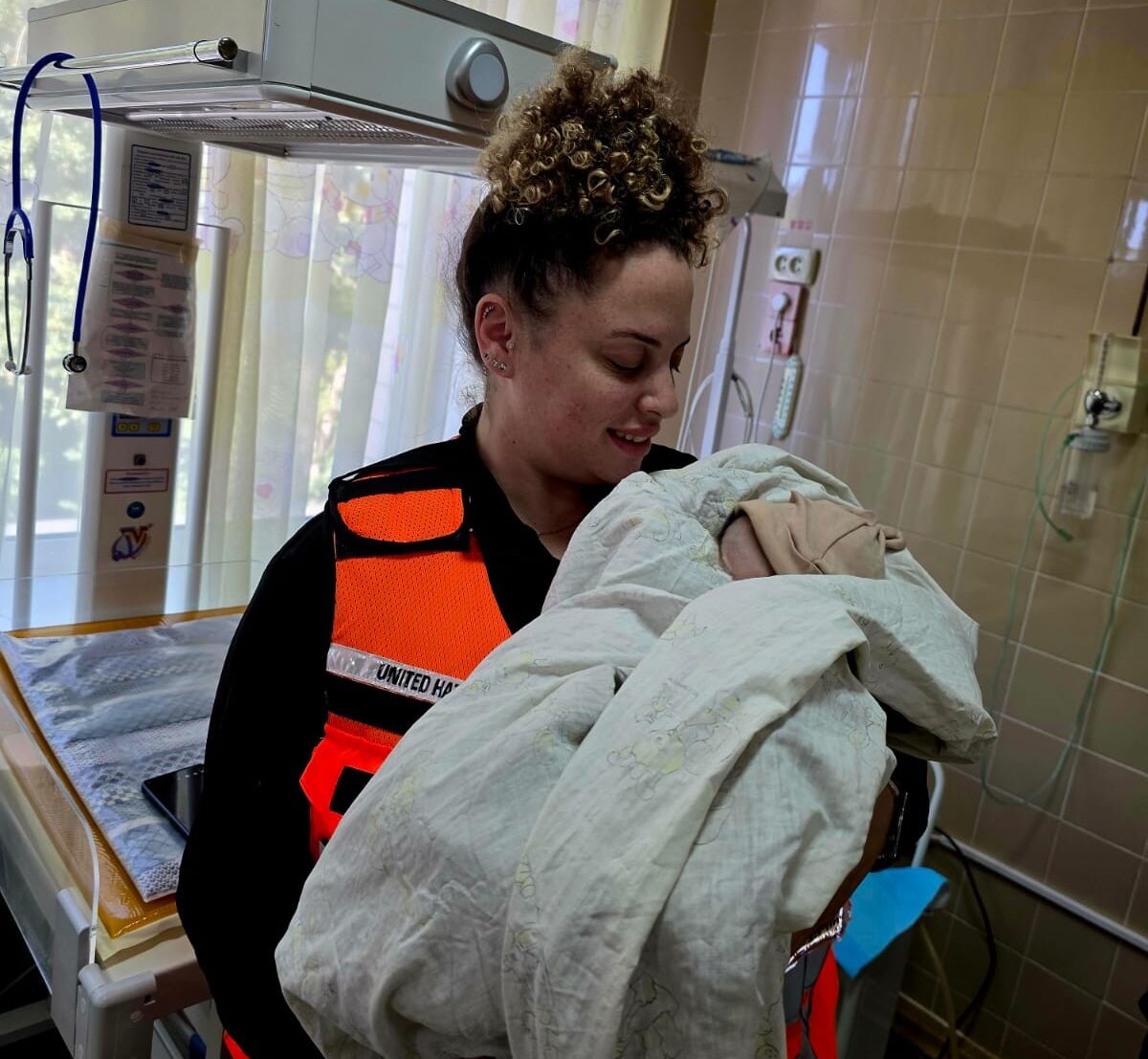 United Hatzalah medic assists in the delivery of a baby in Uman, Ukraine.