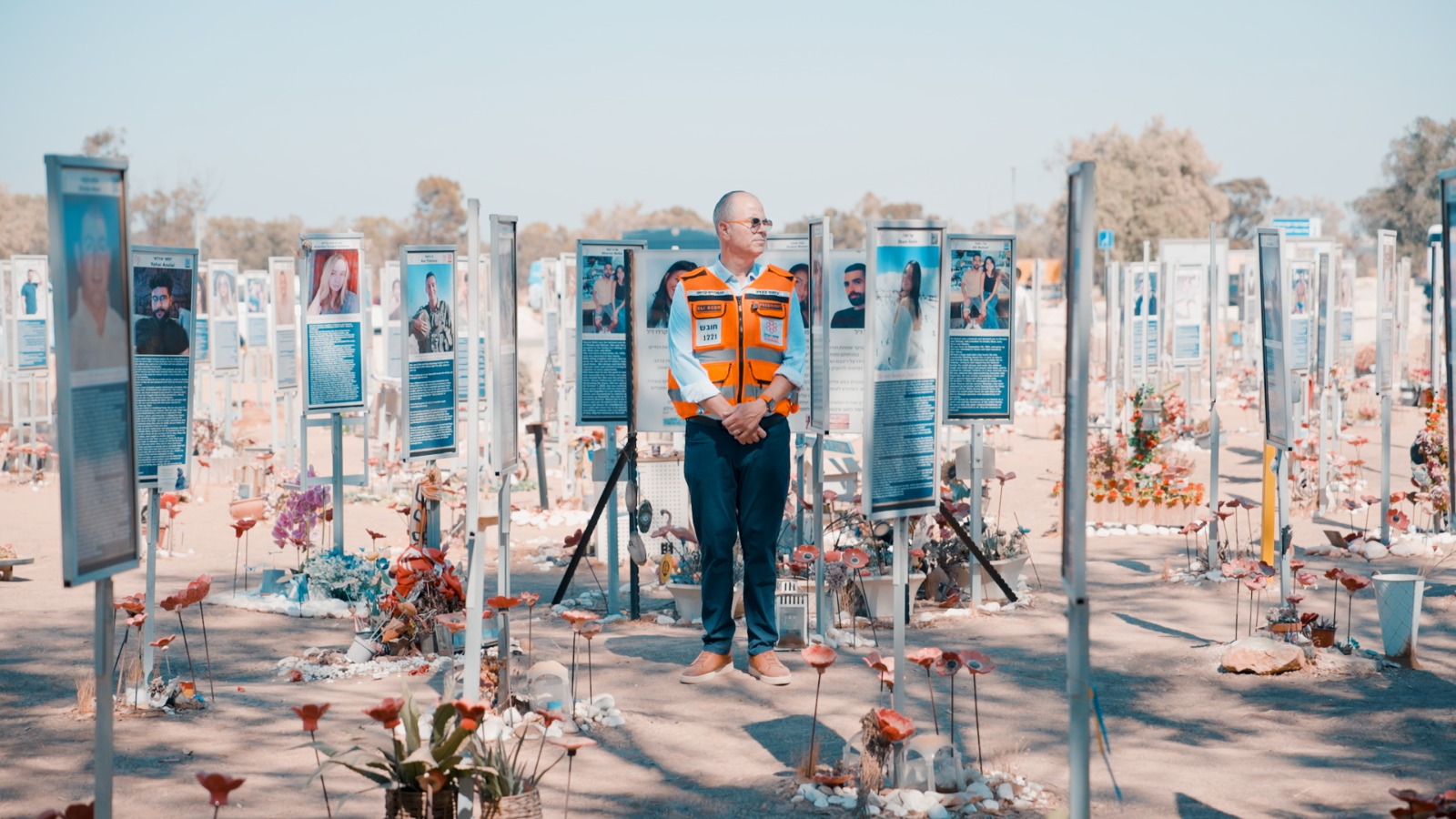 Eli Beer standing in the memorial field on the grounds of the Nova Music Festival in Re'im in Southern Israel